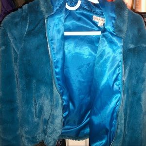 A royal blue fur jacket from fashion Nova